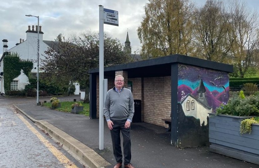 Jackson Carlaw at a bus stop in Eaglesham